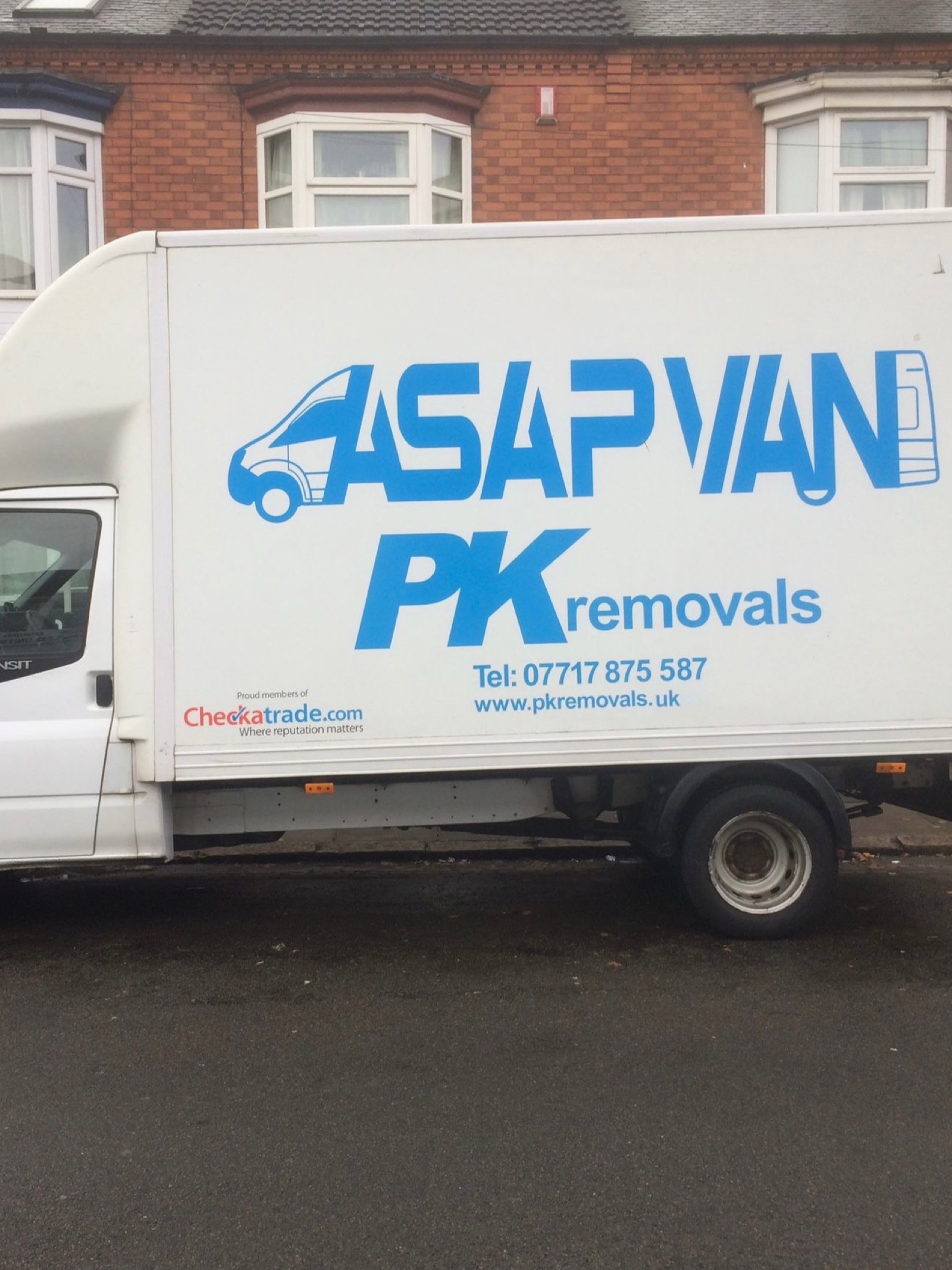 PK Removals Luton van loaded for a Leicester house move with blankets, straps and trolleys